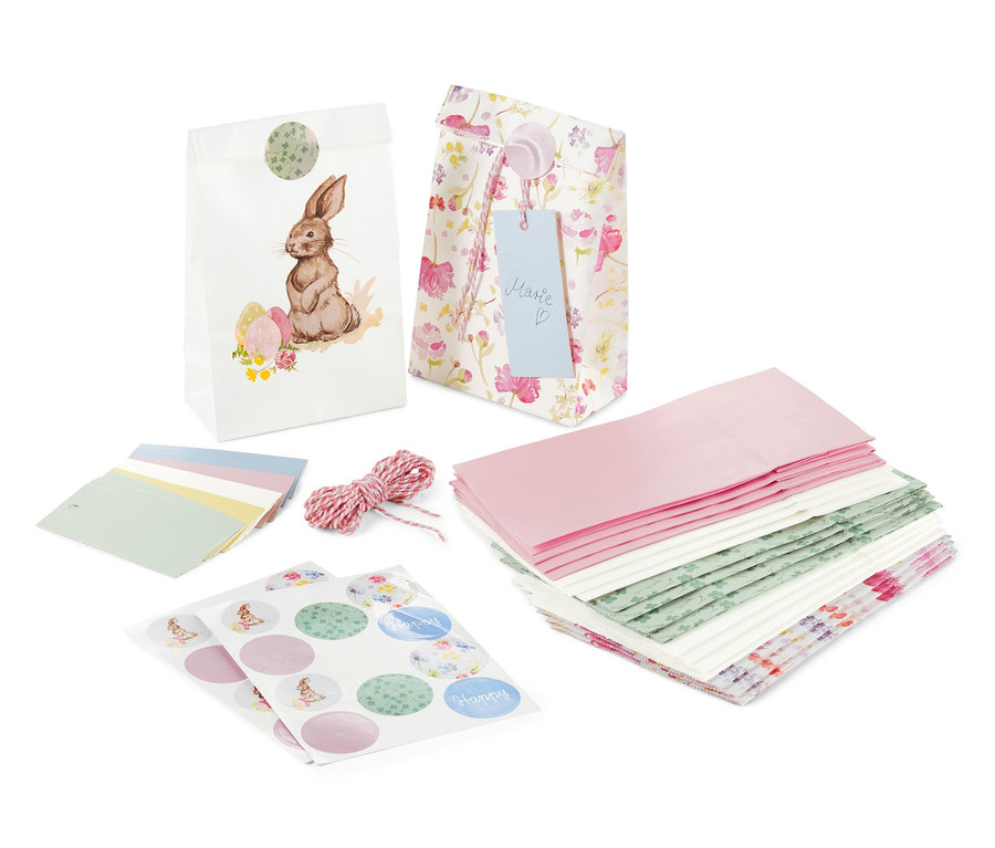 Geschenktüten-Set mit Hasenmotiv, Packpapier und Aufkleber.