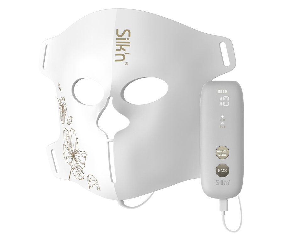 Nahaufnahme der Silk'n LED Gesichtsmaske mit EMS und zugehöriger Steuerung.