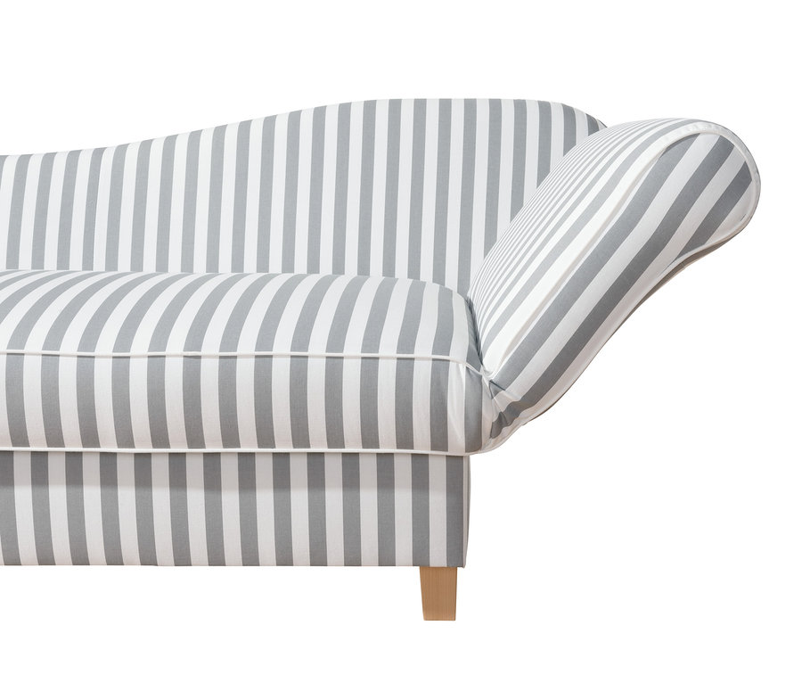 Detailaufnahme einer gestreiften Recamiere »Saturn« mit Stauraum, rechts.