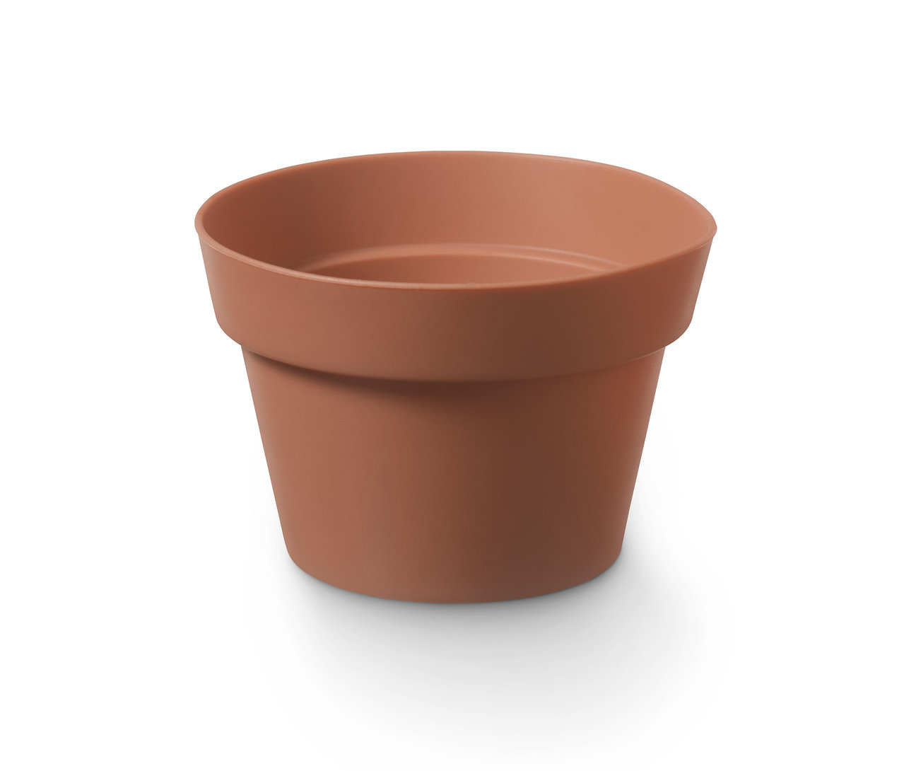 Nahaufnahme einer einzelnen braunen Blumentopf-Muffinform.