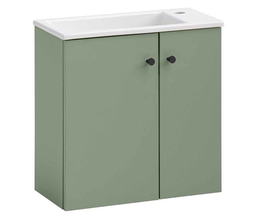 Pistazienfarbener WS Waschtisch »Ebba« mit weißem Waschbecken und zwei schwarzen runden Griffen an den Schranktüren.