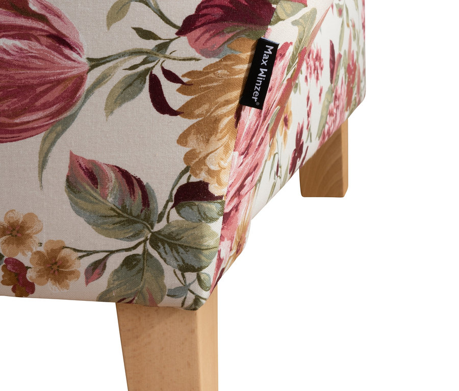 Detail der Max-Winzer®-Recamiere »Saturn« mit Blumenmuster und Holzfüßen.