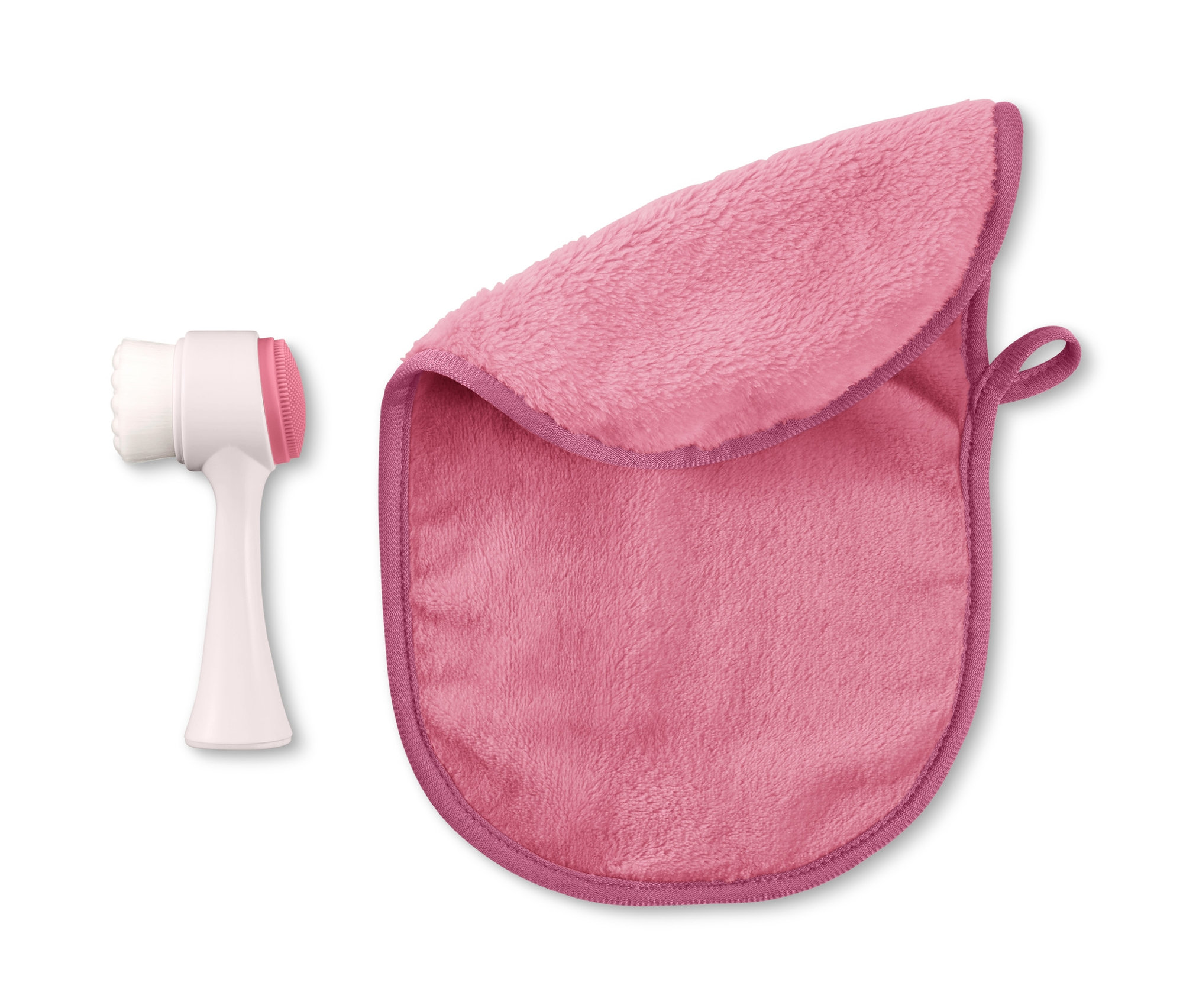 Gesichtsreinigungsbürste und Kosmetiktuch liegen nebeneinander.