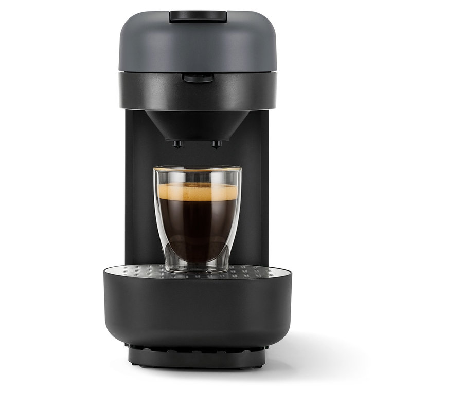 »Call me Pad« Kaffee Padmaschine Graphit mit einer Tasse Kaffee.