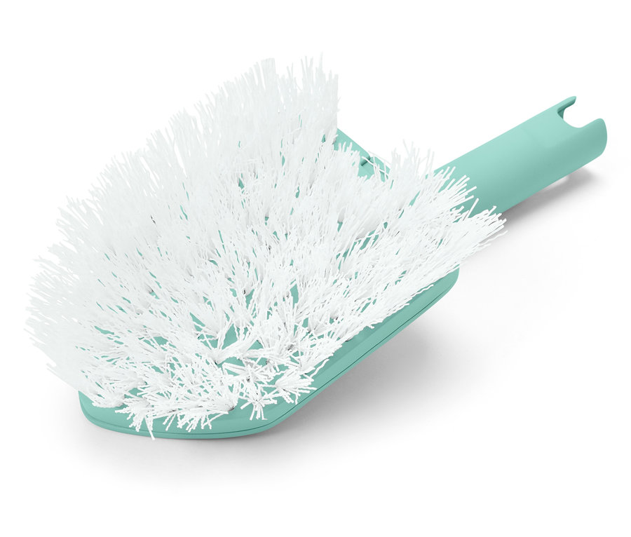 Detailaufnahme einer weißen Bürste mit mintgrünem Griff.