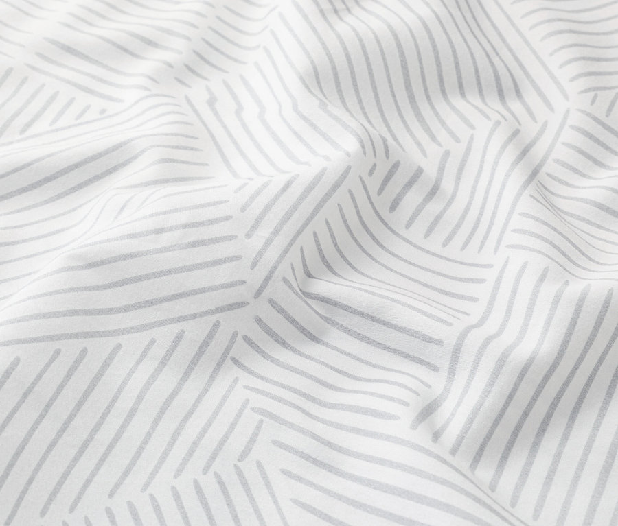 Nahaufnahme von weißem Stoff mit grauen Linien.