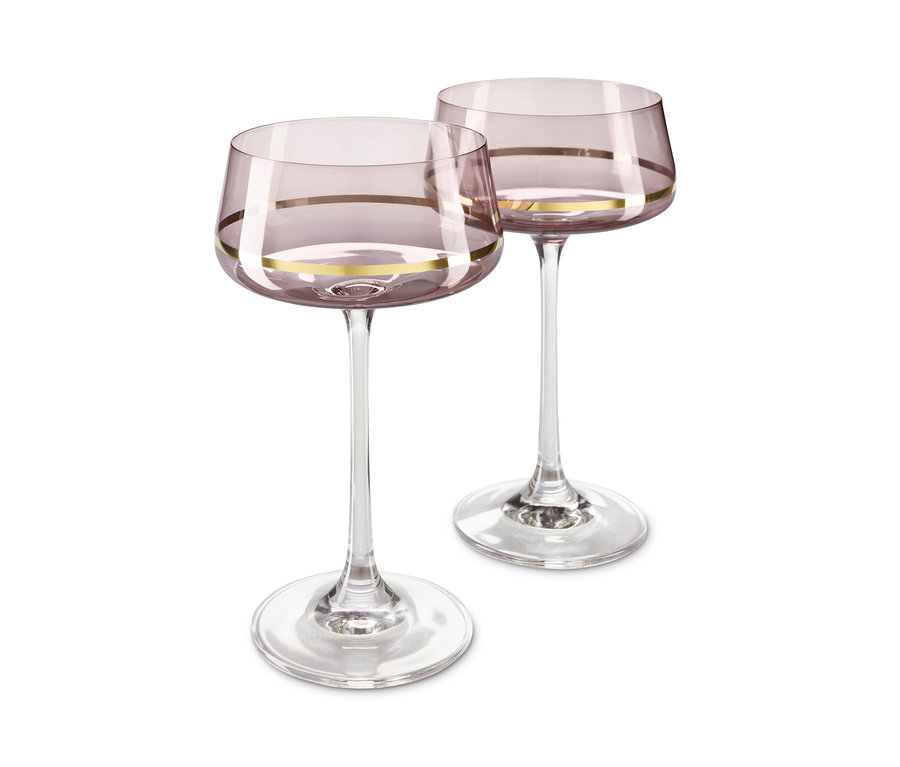 Zwei Champagner- und Cocktailgläser mit dünnem goldenen Streifen.