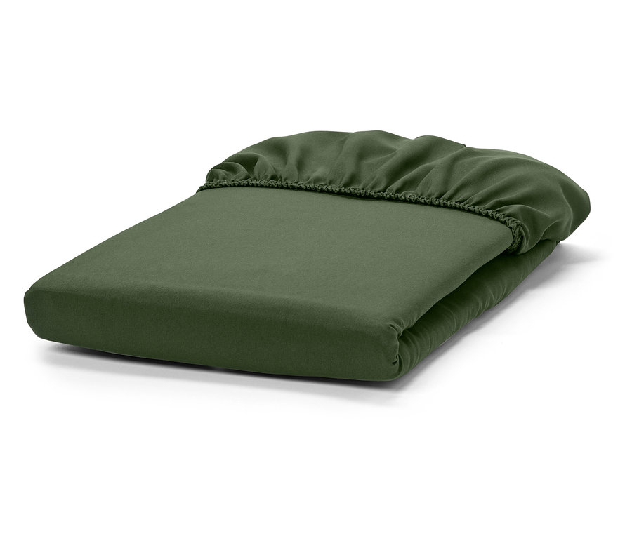 Zusammengefaltetes grünes Spannbettlaken.