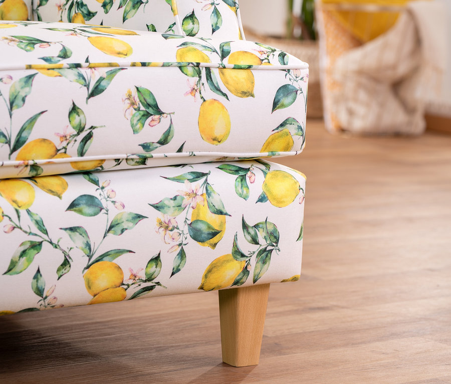 Detailaufnahme des Sessels »Penny« mit Zitronen-Print.