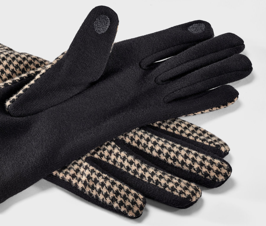 Schwarze Handschuhe im Materialmix mit Hahnentrittmuster.