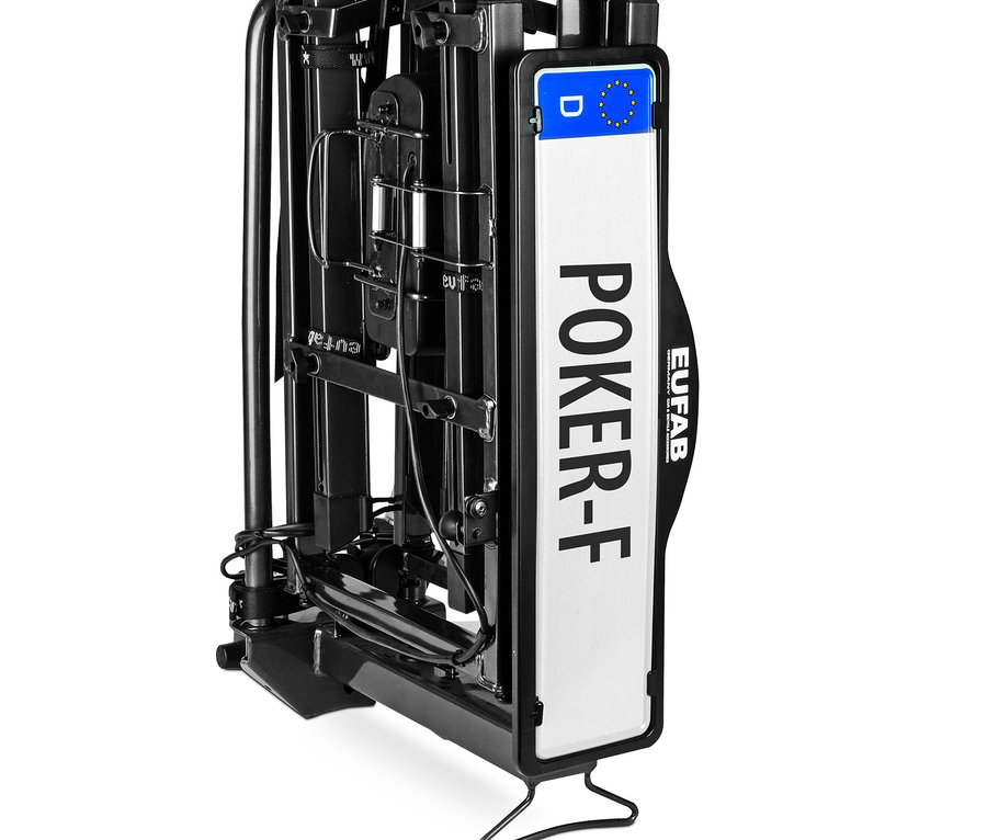 Zusammengeklappter, schwarzer Fahrradträger »Poker-F« vor weißem Hintergrund.