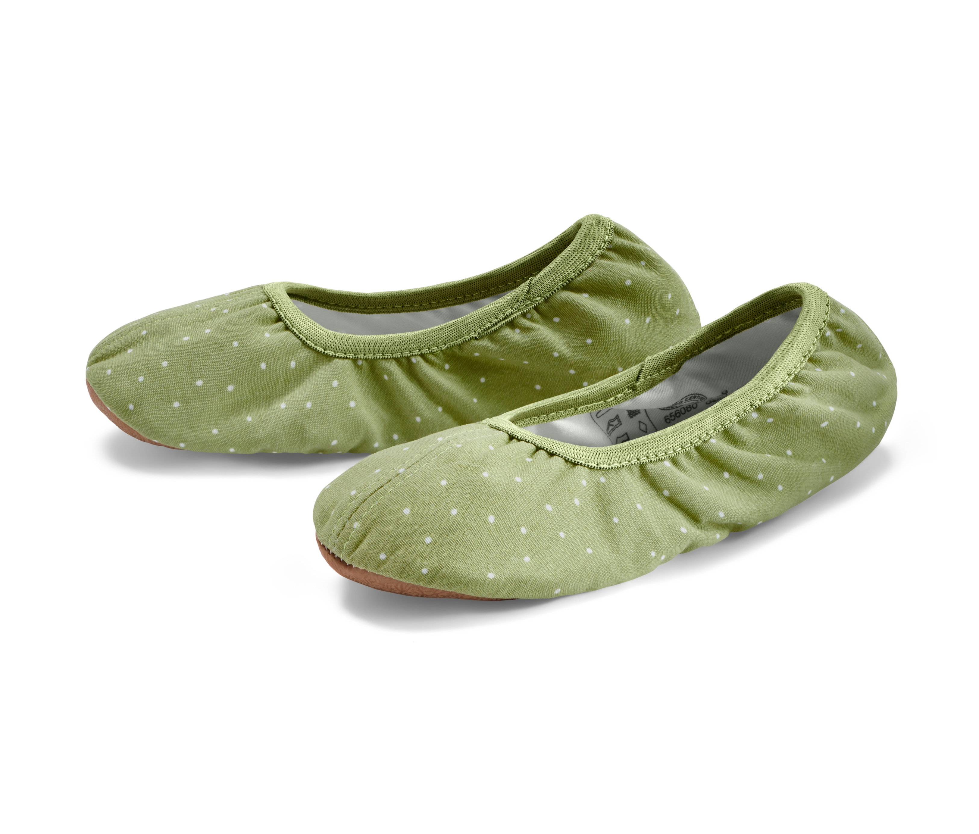 Zwei hellgrüne Kleinkinder-Gymnastikschuhe mit weißen Punkten.