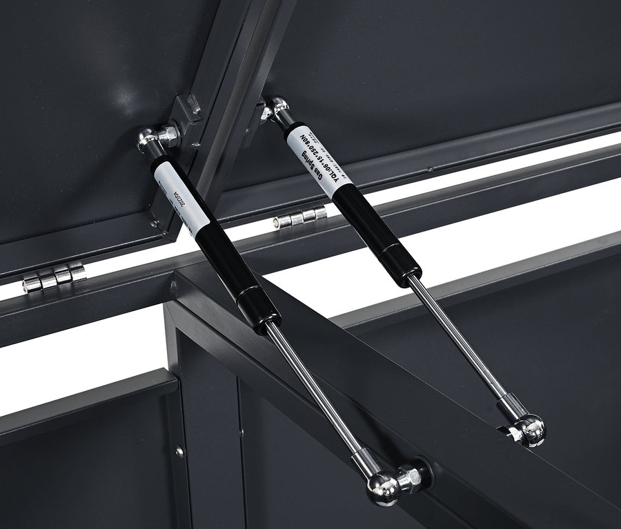 Detailaufnahme eines offenen Aufbewahrungsbehälters mit Gasdruckfedern.