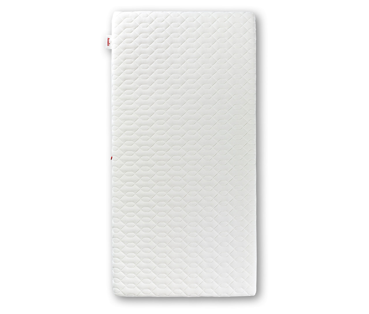 Weiße Paradies Baby- und Kindermatratze »Traumwolke« liegt auf dem Boden.