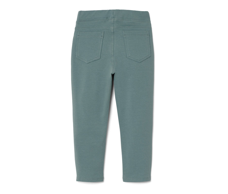 Eine blaue Kleinkind-Treggingshose isoliert auf weißem Hintergrund.