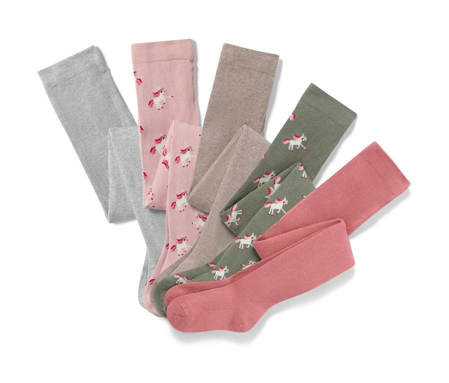 Fünf Baumwoll-Strumpfhosen mit Einhorn-Motiv.
