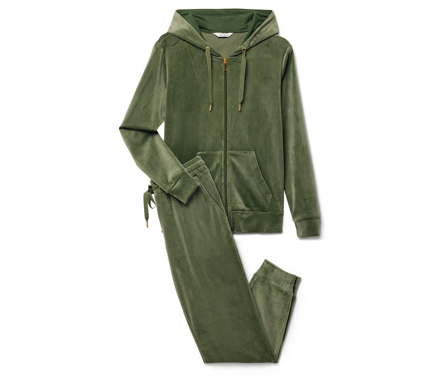 Ein grüner Velours-Trainingsanzug mit Kapuzenjacke und Hose.