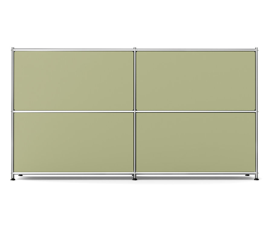 Vier hellgrüne Paneele in einem Chromrahmen.