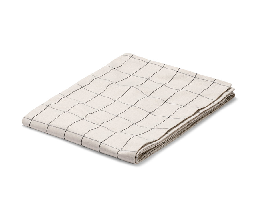 Gefaltete karierte Tischdecke.
