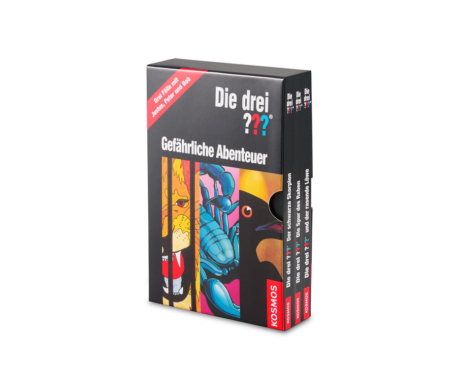Schachtel mit drei Detektivgeschichten »Die drei ???« mit Abbildungen von Löwe, Skorpion und Vogel.