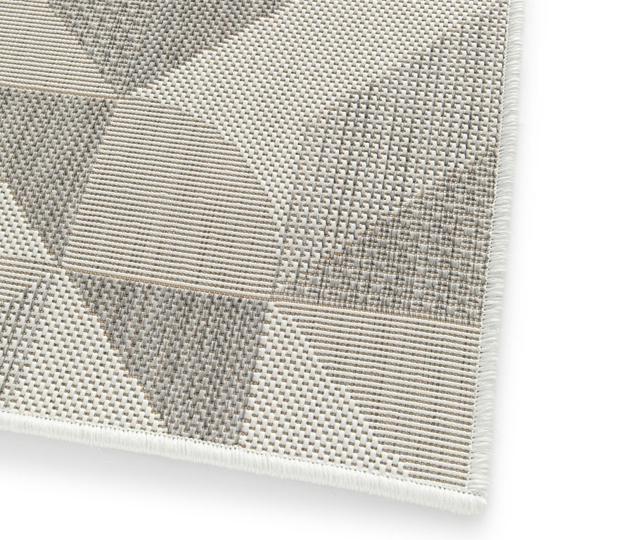 Detailansicht eines faltbaren Outdoor-Teppichs im Mosaik-Design.