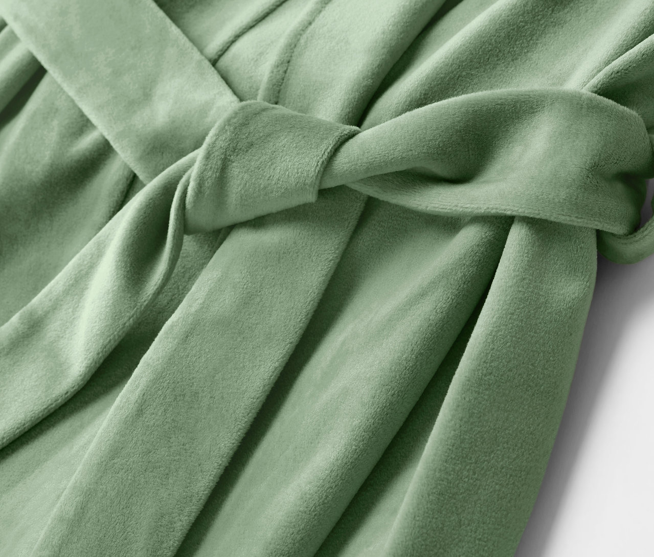 Nahaufnahme eines hellgrünen Bademantels mit gebundenem Gürtel.