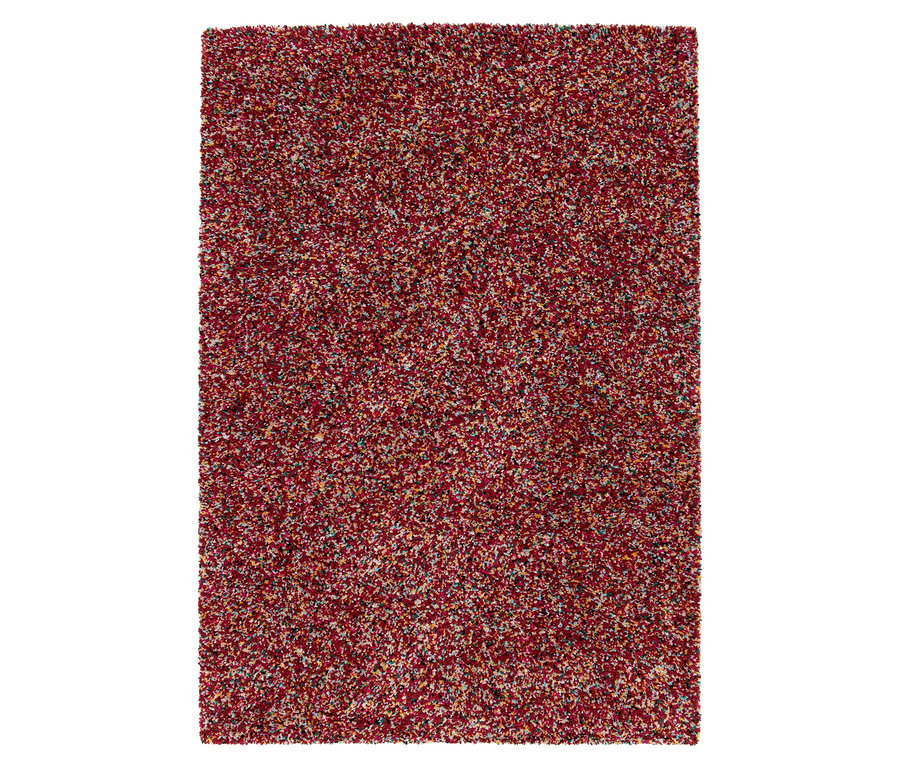 Detailaufnahme eines zotteligen Teppichs »Relic« in der Farbe Autumn Spice.