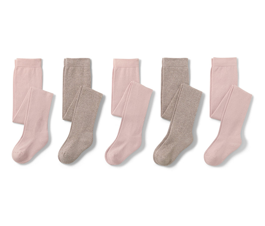 Fünf Baumwoll-Strumpfhosen in Rosa und Braun.