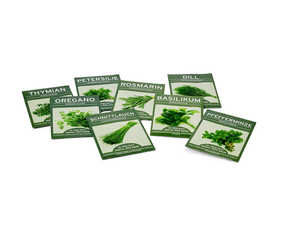 Das Bild zeigt Päckchen mit Samen der 8 Kräuterklassiker, darunter Thymian, Oregano, Petersilie, Rosmarin, Schnittlauch, Dill, Basilikum und Pfefferminze.