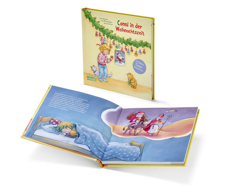 Ein offenes Buch zeigt ein Mädchen, das im Bett schläft und von Nikolaus und Santa träumt.