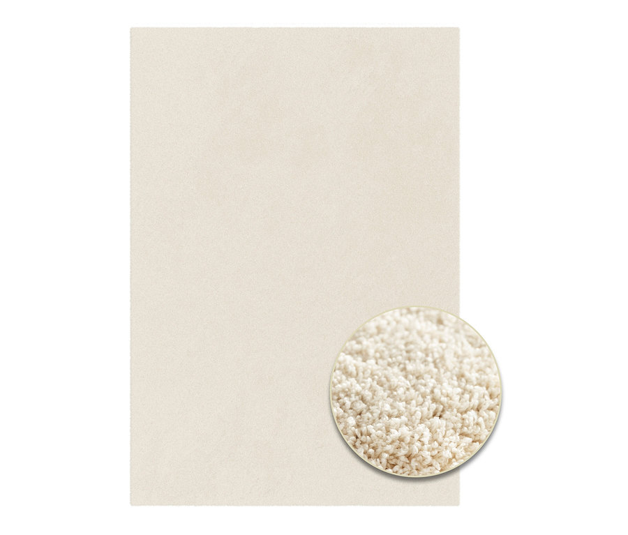 Wollweißer Teppich »Mellow« mit Detailansicht der Textur.