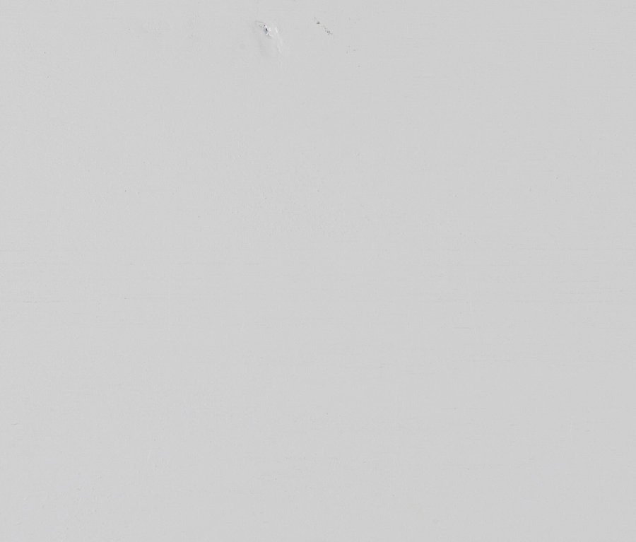 Detailaufnahme einer weißen Woood Nikki Schreibtischplatte.