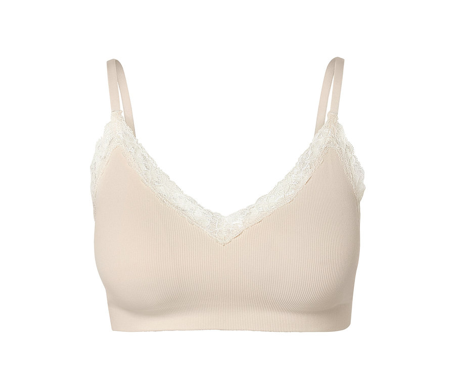 Detailansicht eines creme Seamless-Bustiers.