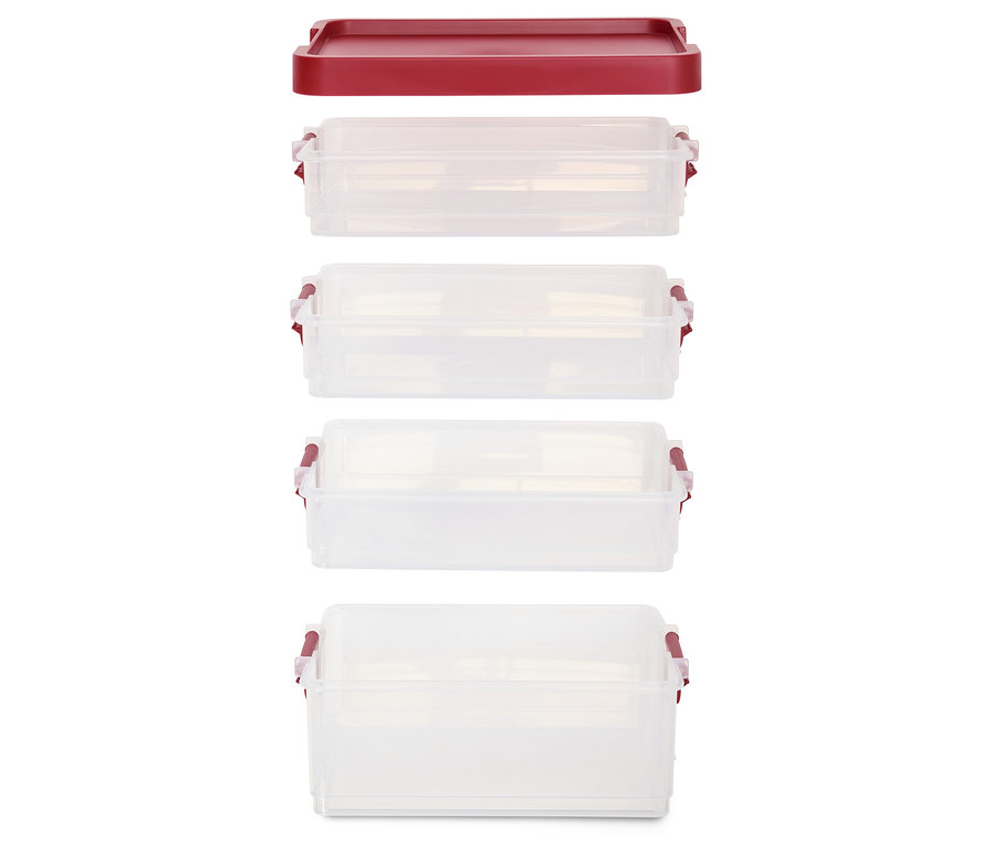 Stapel aus vier transparenten Plastikbehältern mit einem Deckel oben.
