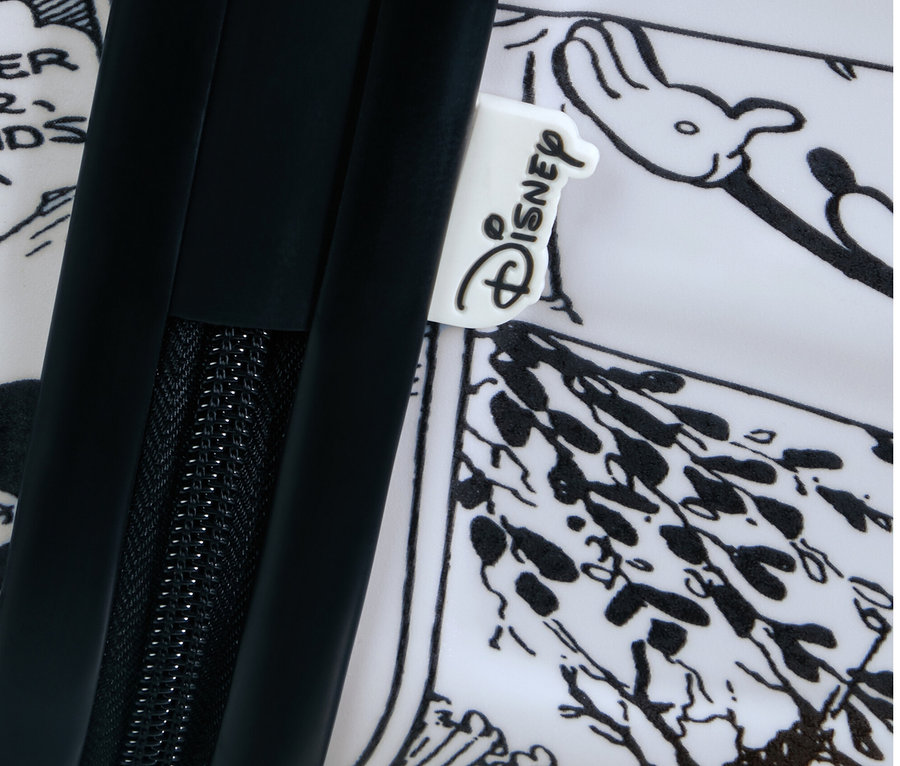 Detail eines großen American Tourister Wavebreaker »Minnie Mouse« Koffers mit schwarz-weißem Disney-Druck.