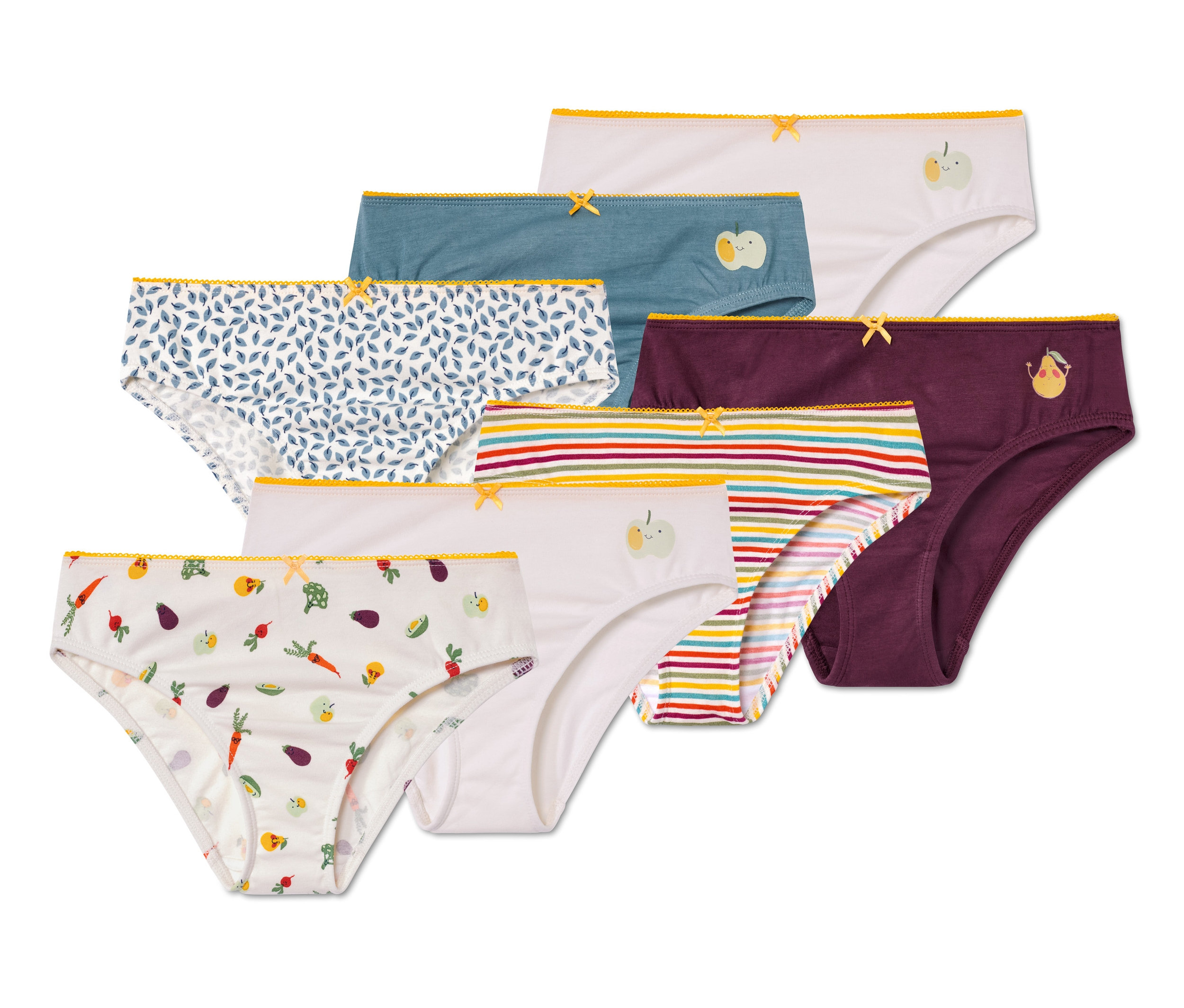 Sieben Mädchenslips in verschiedenen Farben und Mustern.