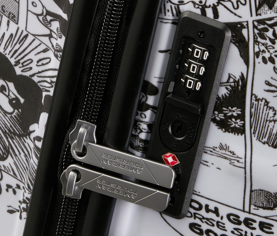 Detailansicht eines American Tourister Wavebreaker »Minnie Mouse« Koffers (groß) mit schwarz-weißem Muster.