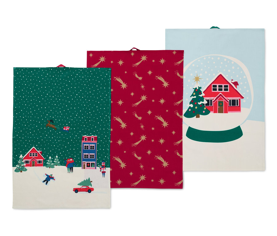 Drei Geschirrtücher mit Weihnachtsmotiven.