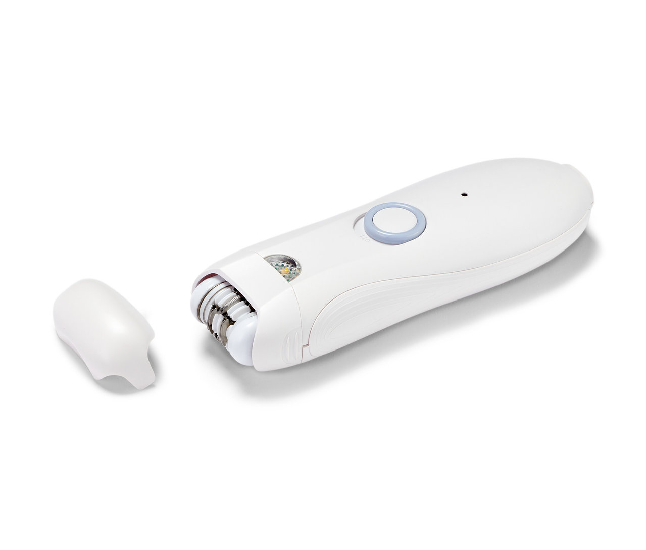 Detailaufnahme eines weißen Gesichtsepilierers mit abnehmbarem Aufsatz.