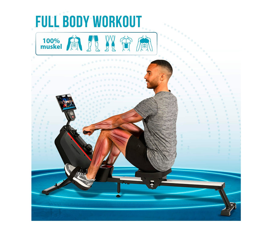 Mann trainiert auf dem Rudergerät RW 1000.