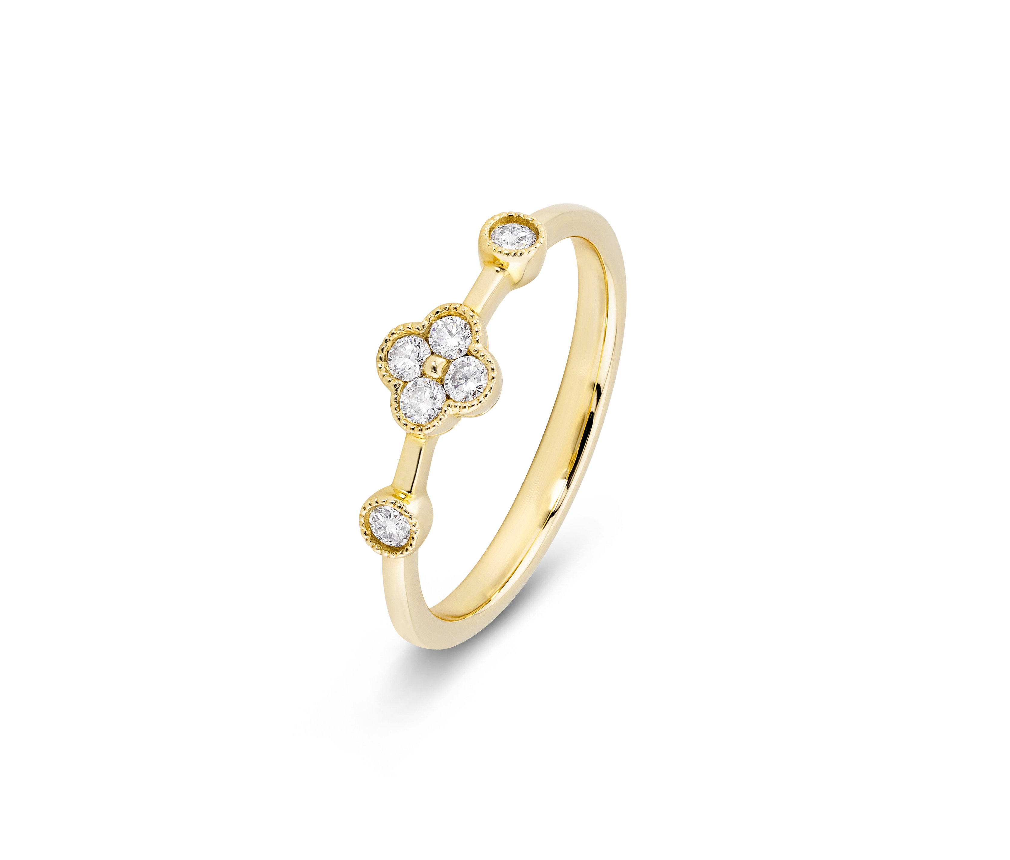 Nahaufnahme eines goldenen 585 Goldrings mit Diamanten in Form einer vierblättrigen Blume.