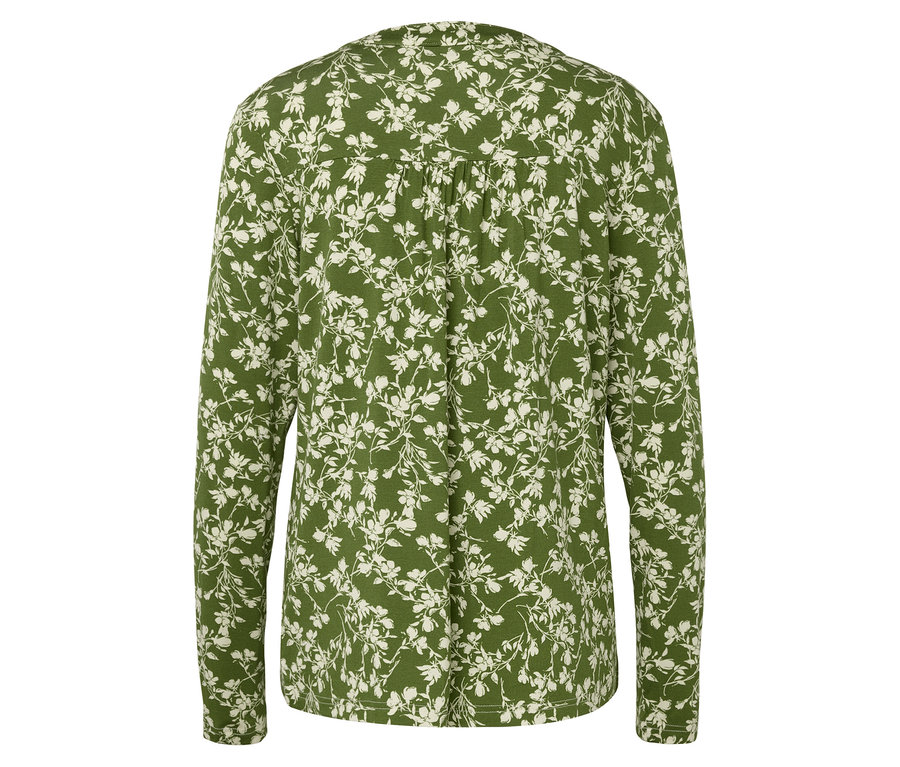 Rückansicht einer grünen, langärmeligen Bluse mit weißem Blumenmuster.