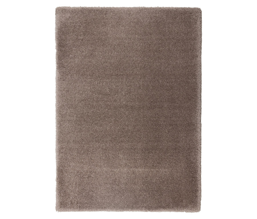 Nahaufnahme eines rechteckigen, getufteten, beigefarbenen »Pleasure« Teppichs.