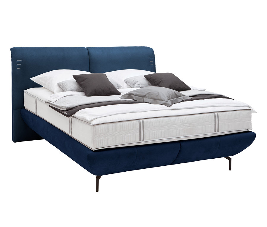 Detailaufnahme des violettblauen Boxspringbetts »Cherie« von ADA AUSTRIA premium, 160 x 200 cm.