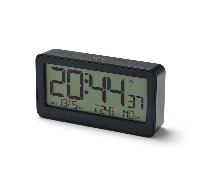 Ein schwarzer digitaler LCD-Funkwecker zeigt die Zeit 20:44.
