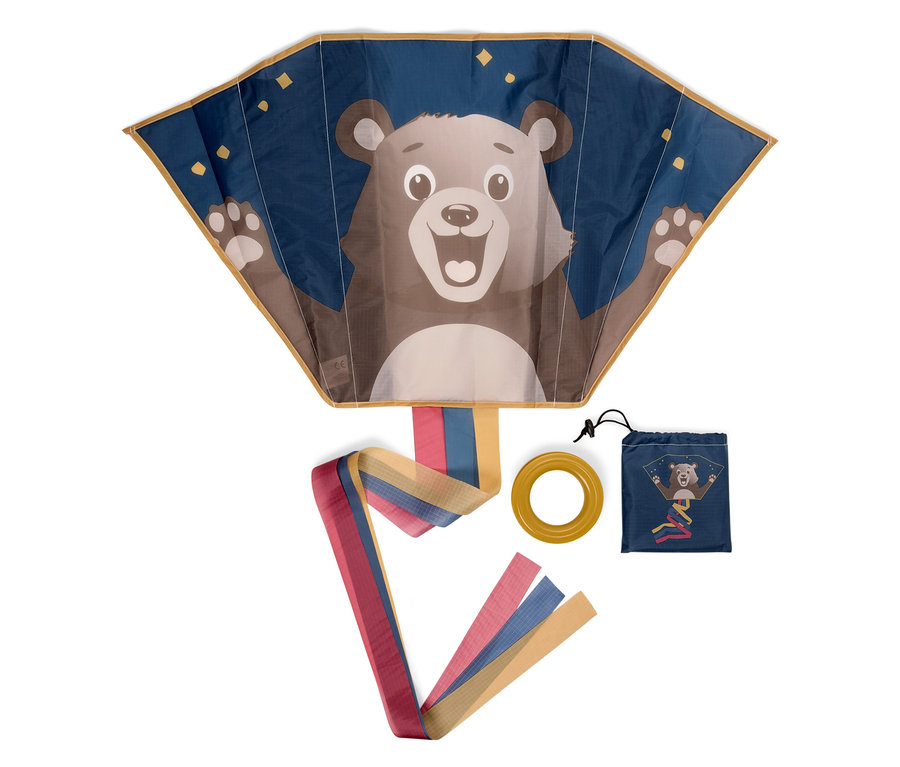 Blauer Drachen mit Bär, gelber Ring und blaue Hülle mit gleichem Aufdruck auf weißem Hintergrund.