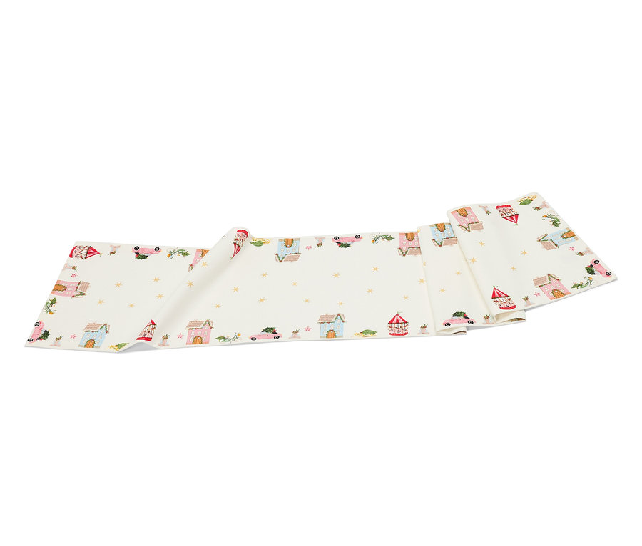 Ein weißer Stoffstreifen mit gezeichneten Häusern, Autos und Sternen.