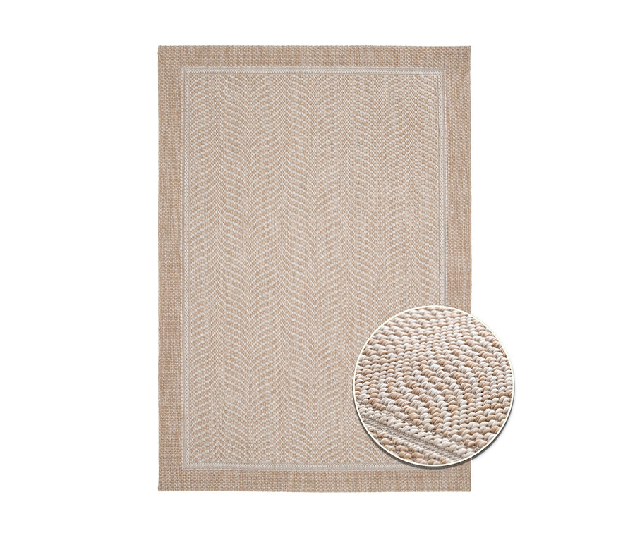 Ein beiger Teppich »Twine« mit Fischgrätenmuster.