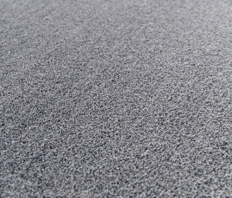 Detailansicht eines grauen Teppichs "Mellow".