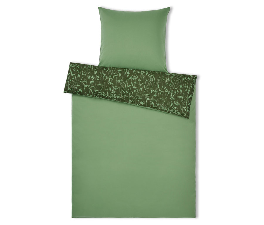 Grüne Bettwäsche mit Blumenmuster und Kissen oben.